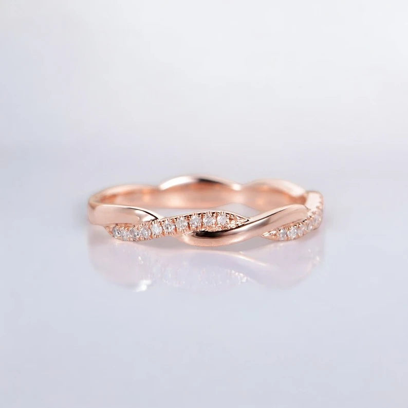 Twisted Infinity Ring- A beautiful lab-grown diamond jewelry piece, showcasing sparkling diamonds set in a stylish design, perfect for special occasions.